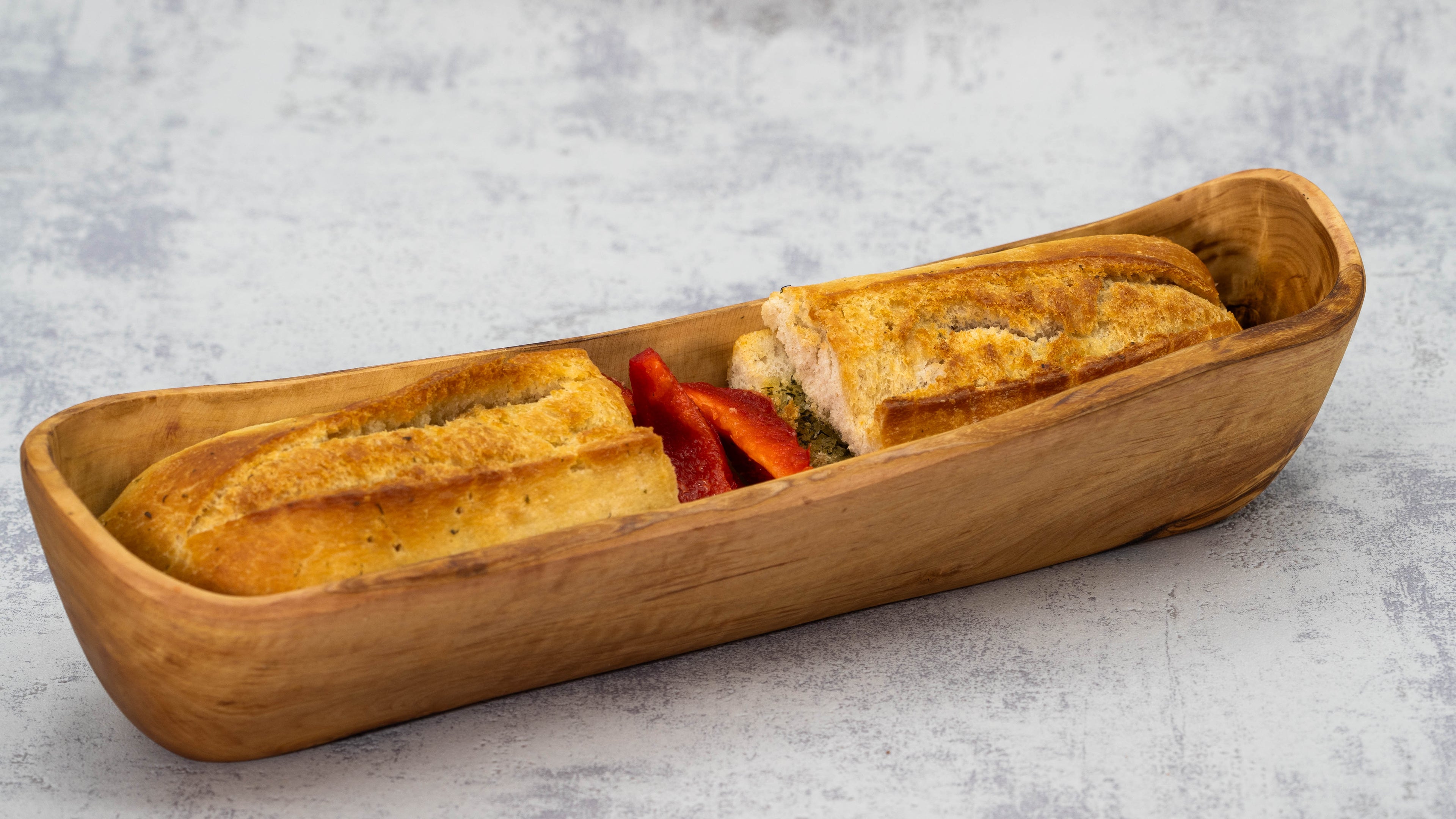 Rustikale Baguetteschale aus Olivenholz